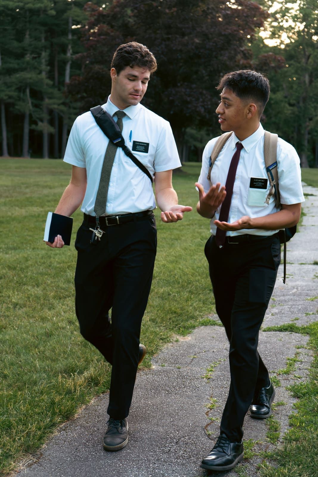 Two missionaries talking together outdoors